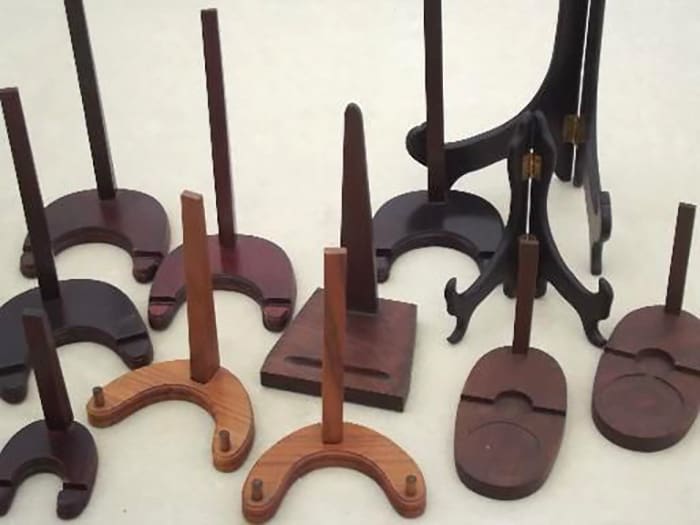 A collection of vintage plate stands image