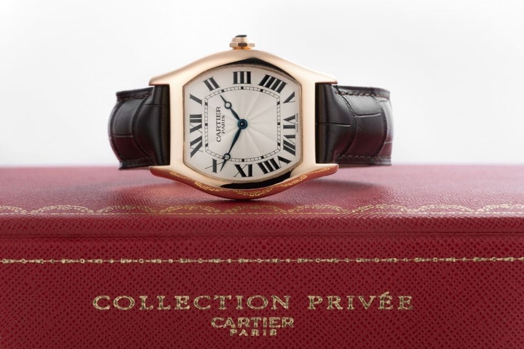 Above: A Cartier Tortue wristwatch, ref. 2496C. Released between 1998 and 2008 as part of Cartier’s Collection Privée.