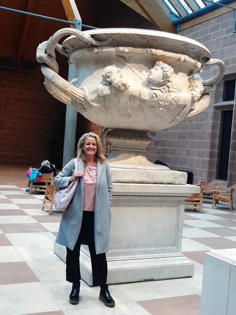 Fiona in front of The Warwick Vase. Discovered around 1770 at Hadrian’s Villa in Tivoli, by Gavin Hamilton, a Scottish painter and art dealer in Rome, it’s now an imposing centrepiece in the foyer of The Burrell Collection.