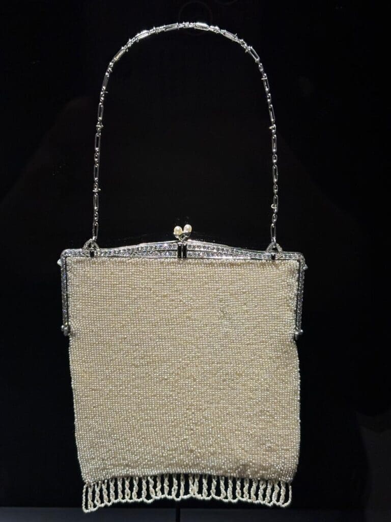 A platinum, onyx, natural pearl and diamond evening bag by Van Cleef & Arpels, circa 1924. VCA Collection.
