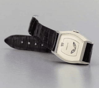 A Patek Philippe platinum tonneau-shaped jump hour wristwatch, retailed by Tiffany & Co, circa 1930. Sold at Christies New York in 2004 for $589,900.