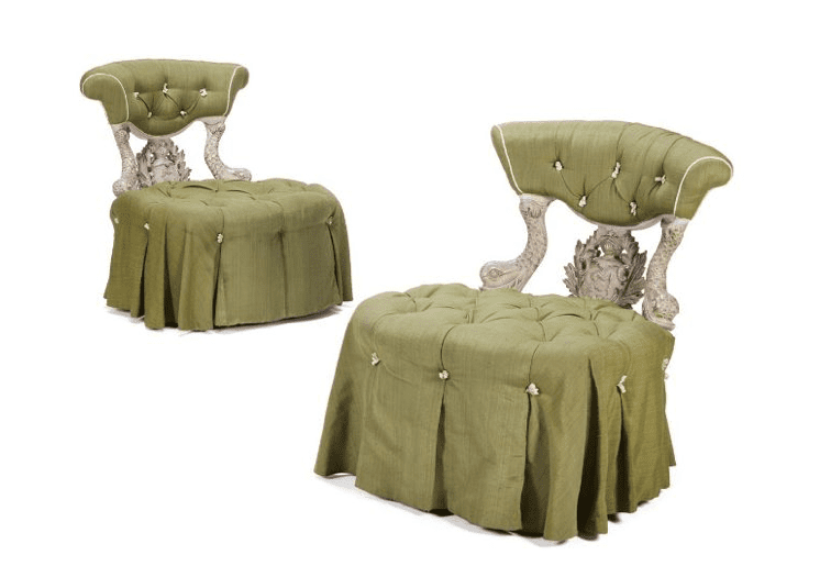 A pair of Syrie Maugham ‘Dolphin’ chairs, insurance replacement region of £18,000.