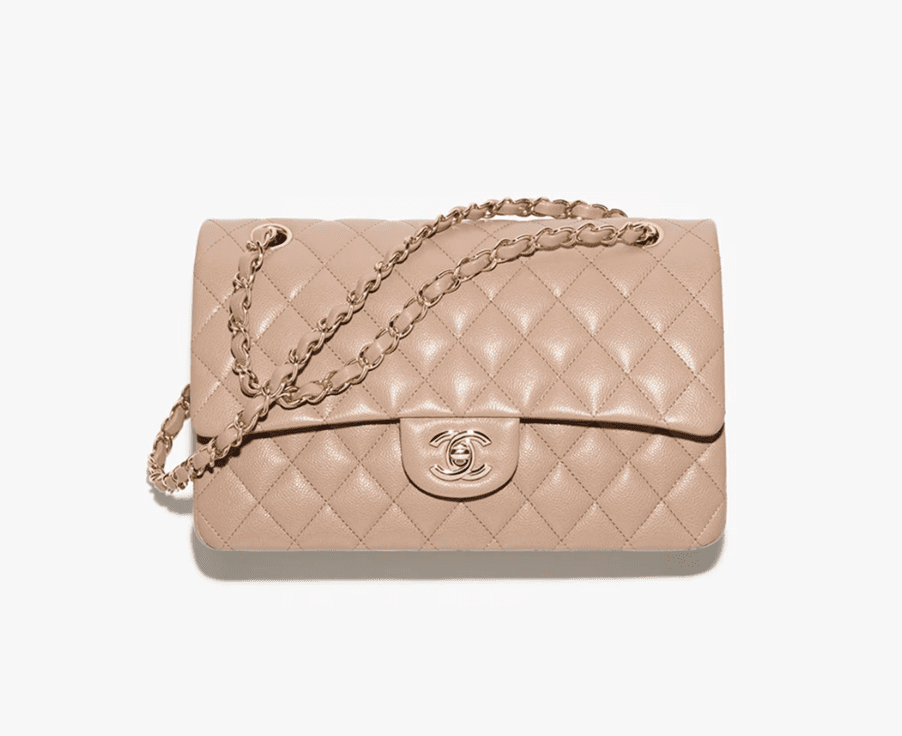 Chanel Classic Double Flap handbag in beige caviar leather with gold-tone hardware.