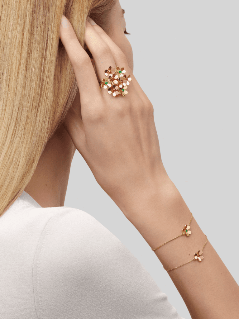 This Frivole ring with 8 flowers featuring rubies and emeralds retails for £11,700