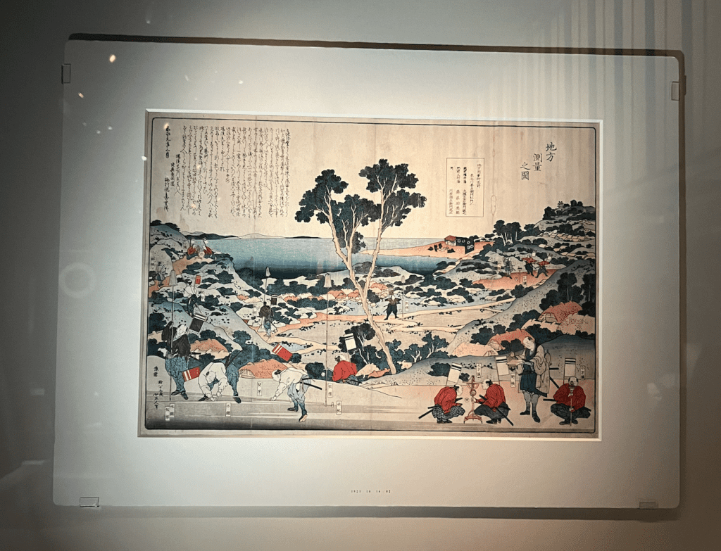 Hokusai’s woodblock print of land surveyors (1848) on display at the British Museum. Photograph by Ashley Innes.