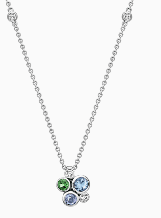 The Boodles Raindance Watercolour White Gold Cluster Pendant. Set with aquamarine, diamond, tanzanite and tsavorite garnet. Recommended replacement value £6,300