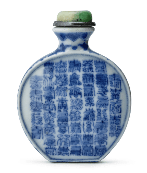 An Imperial blue-and-white snuff bottle with fifty written shou characters and a Qianlong mark, sold at Bonhams New York in 2021. Photograph by Bonhams.